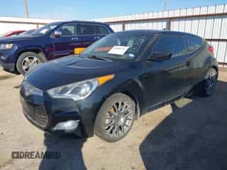 2013 Hyundai Veloster w/Gray Int z VIN KMHTC6ADXDU108497, wystawiony jako IAAI lot #43408721 z przebiegiem 100 974 mil mil oraz . Historia ofert i sprzedaży dostępna na DreamBid. Obrazek 2.