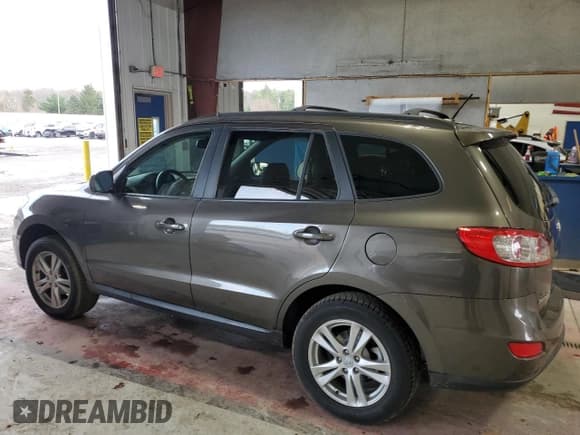✅ 2012 Hyundai Santa Fe SE • VIN: 5XYZH4AG6CG135162 • Lot: 79197764. Listed on Copart with 87,661 mi. Free auction sales archive from the USA and detailed vehicle history report at DreamBid. Image 2.