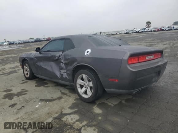✅ 2014 Dodge Challenger SXT 100th Anniversary • VIN: 2C3CDYAG9EH153155 • Lot: 85796844. Wystawiony na Copart z przebiegiem 124 262 mil. Bezpłatny archiwum sprzedaży aukcyjnych z USA i szczegółowy raport historii pojazdu na DreamBid. Zdjęcie 2.
