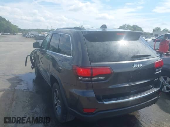 2021 Jeep Grand Cherokee 80th Anniversary with VIN 1C4RJEBG8MC636293, listed as a IAAI auction lot 42898455 with 82,338 mi miles and . Bid and sale history available at DreamBid. Image 3.