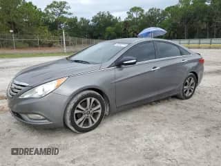 2013 Hyundai Sonata Limited with VIN 5NPEC4AC8DH667078, listed as a Copart auction lot 68282715 with 164,936 mi miles and Salvage title. Bid and sale history available at DreamBid. Image 1.