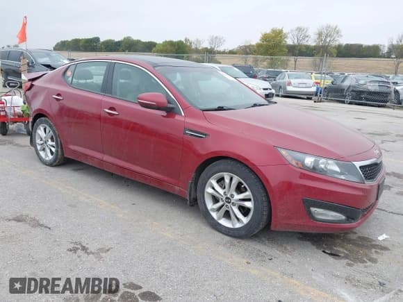✅ 2011 Kia Optima EX • VIN: KNAGN4A7XB5158142 • Lot: 43446895. Listed on IAAI with 113,889 mi. Free auction sales archive from the USA and detailed vehicle history report at DreamBid. Image 1.