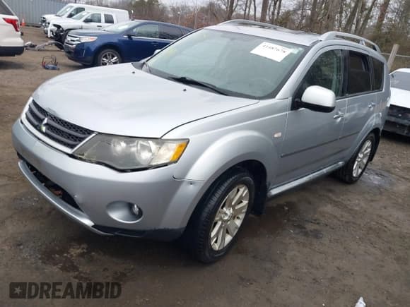 ✅ 2009 Mitsubishi Outlander SE • VIN: JA4MT31W89Z003101 • Lot: 41487678. Listed on IAAI with 90,226 mi. Free auction sales archive from the USA and detailed vehicle history report at DreamBid. Image 2.