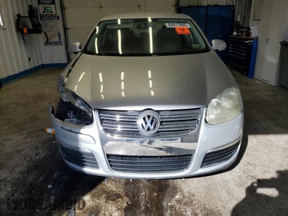 ✅ 2009 Volkswagen Jetta S • VIN: 3VWJZ71K99M010312 • Лот: 84917885. Опубликован ранее на Copart с пробегом 142 057 миль. Бесплатный доступ к архиву аукционных продаж из США и подробный отчёт об истории автомобиля на DreamBid. Изображение 5.