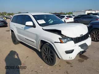 2022 Jeep Grand Cherokee Laredo E with VIN 1C4RJEAGXNC127857, listed as a IAAI auction lot 43202403 with 66,201 mi miles and . Bid and sale history available at DreamBid. Image 1.