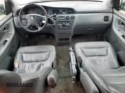 ✅ 2004 Honda Odyssey EX-L • VIN: 5FNRL18094B037158 • Лот: 82276095. Опубликован ранее на Copart с пробегом 234 840 миль. Бесплатный доступ к архиву аукционных продаж из США и подробный отчёт об истории автомобиля на DreamBid. Изображение 8.