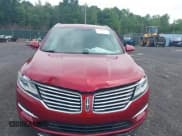 ✅ 2015 Lincoln MKC • VIN: 5LMCJ2A96FUJ29941 • Lot: 42601534. Listed on IAAI with 44,324 mi. Free auction sales archive from the USA and detailed vehicle history report at DreamBid. Image 12.