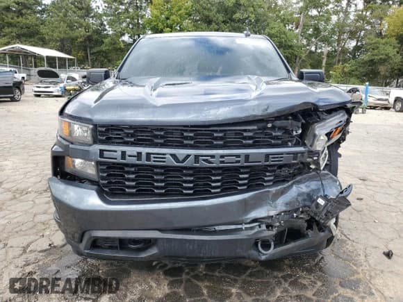 ✅ 2021 Chevrolet Silverado 1500 Custom • VIN: 1GCRWBEK5MZ374276 • Lot: 85644425. Wystawiony na Copart z przebiegiem 57 860 mil. Bezpłatny archiwum sprzedaży aukcyjnych z USA i szczegółowy raport historii pojazdu na DreamBid. Zdjęcie 5.