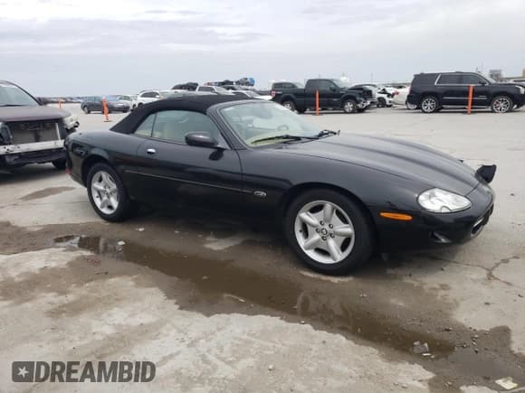 ✅ 1997 Jaguar XK • VIN: SAJGX2744VC014859 • Лот: 50697465. Опубликован ранее на Copart с пробегом 50 119 миль. Бесплатный доступ к архиву аукционных продаж из США и подробный отчёт об истории автомобиля на DreamBid. Изображение 4.