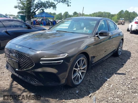 ✅ 2025 Genesis G70 2.5T • VIN: KMTG34SC7SU145845 • Лот: 42949762. Опубликован ранее на IAAI с пробегом 21 004 миль. Бесплатный доступ к архиву аукционных продаж из США и подробный отчёт об истории автомобиля на DreamBid. Изображение 2.