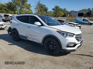 ✅ 2017 Hyundai Santa Fe Ultimate • VIN: 5XYZWDLAXHG447314 • Лот: 85910775. Опубликован ранее на Copart с пробегом 121 017 миль. Бесплатный доступ к архиву аукционных продаж из США и подробный отчёт об истории автомобиля на DreamBid. Изображение 4.