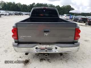 2005 Dodge Dakota SLT с VIN 1D7HW42N95S290614, выставлен на аукционе Copart как лот 72079414 с пробегом 130 925 миль миль и Списание • Salvage title. История ставок и продаж доступна на DreamBid. Изображение 6.