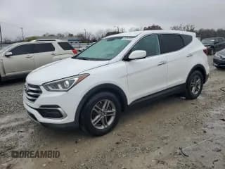 ✅ 2018 Hyundai Santa Fe 2.4L • VIN: 5XYZT3LBXJG563016 • Lot: 92369555. Listed on Copart with 121,374 mi. Free auction sales archive from the USA and detailed vehicle history report at DreamBid. Image 1.