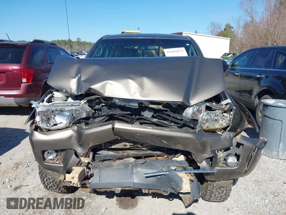 ✅ 2014 Toyota Tacoma • VIN: 5TFLU4EN4EX107161 • Lot: 41411872. Wystawiony na IAAI z przebiegiem 134 273 mil. Bezpłatny archiwum sprzedaży aukcyjnych z USA i szczegółowy raport historii pojazdu na DreamBid. Zdjęcie 12.