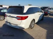 ✅ 2018 Honda Odyssey EX-L • VIN: 5FNRL6H72JB044152 • Лот: 43621579. Опубликован ранее на IAAI с пробегом 103 577 миль. Бесплатный доступ к архиву аукционных продаж из США и подробный отчёт об истории автомобиля на DreamBid. Изображение 4.