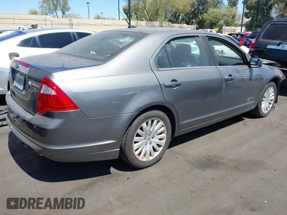 ✅ 2010 Ford Fusion Hybrid • VIN: 3FADP0L38AR221680 • Lot: 43175219. Wystawiony na IAAI z przebiegiem 215 650 mil. Bezpłatny archiwum sprzedaży aukcyjnych z USA i szczegółowy raport historii pojazdu na DreamBid. Zdjęcie 4.