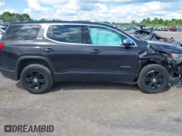 ✅ 2019 GMC Acadia SLE • VIN: 1GKKNRLA0KZ142788 • Lot: 39914264. Listed on IAAI with 84,104 mi. Free auction sales archive from the USA and detailed vehicle history report at DreamBid. Image 13.