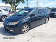 ✅ 2011 Honda Odyssey Touring • VIN: 5FNRL5H94BB508457 • Lot: 42607918. Listed on IAAI with 490,827 mi. Free auction sales archive from the USA and detailed vehicle history report at DreamBid. Image 17.
