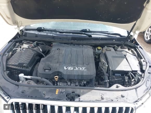 ✅ 2013 Buick LaCrosse Premium 2 • VIN: 1G4GH5E39DF129375 • Lot: 41741851. Wystawiony na IAAI z przebiegiem 124 404 mil. Bezpłatny archiwum sprzedaży aukcyjnych z USA i szczegółowy raport historii pojazdu na DreamBid. Zdjęcie 10.