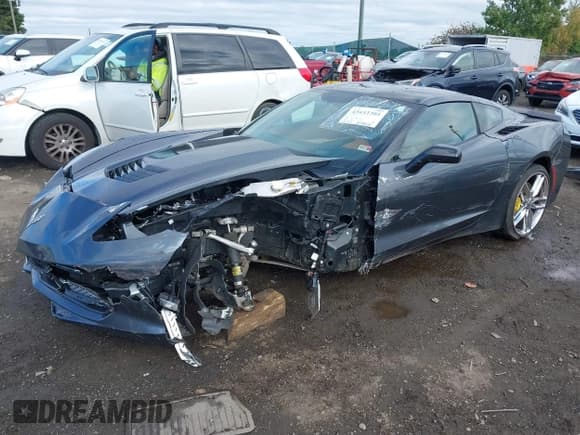 ✅ 2014 Chevrolet Corvette Z51 3LT • VIN: 1G1YL2D70E5105363 • Lot: 43432205. Listed on IAAI with 25,347 mi. Free auction sales archive from the USA and detailed vehicle history report at DreamBid. Image 2.