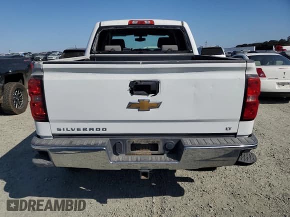 ✅ 2014 Chevrolet Silverado 1500 LT • VIN: 3GCUKREC4EG236995 • Лот: 80578015. Опубликован ранее на Copart с пробегом 130 371 миль. Бесплатный доступ к архиву аукционных продаж из США и подробный отчёт об истории автомобиля на DreamBid. Изображение 6.
