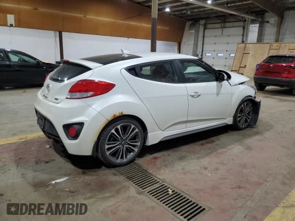 ✅ 2016 Hyundai Veloster Turbo • VIN: KMHTC6AE2GU250680 • Lot: 81348314. Wystawiony na Copart z przebiegiem 124 897 mil. Bezpłatny archiwum sprzedaży aukcyjnych z USA i szczegółowy raport historii pojazdu na DreamBid. Zdjęcie 3.
