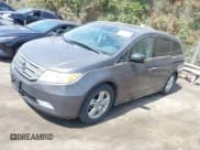 ✅ 2012 Honda Odyssey Touring • VIN: 5FNRL5H92CB116899 • Lot: 41907863. Listed on IAAI with 225,221 mi. Free auction sales archive from the USA and detailed vehicle history report at DreamBid. Image 2.