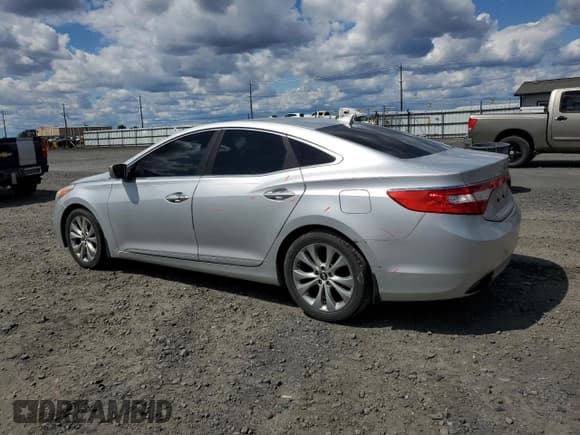 ✅ 2013 Hyundai Azera • VIN: KMHFG4JG7DA218926 • Лот: 57419495. Опубликован ранее на Copart с пробегом 90 968 миль. Бесплатный доступ к архиву аукционных продаж из США и подробный отчёт об истории автомобиля на DreamBid. Изображение 2.