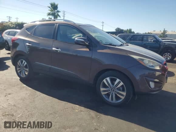 2014 Hyundai Tucson SE z VIN KM8JU3AG0EU795228, wystawiony jako Copart lot #69202565 z przebiegiem 138 146 mil mil oraz Czysty tytuł • Clean title. Historia ofert i sprzedaży dostępna na DreamBid. Obrazek 4.