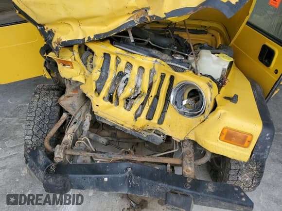 ✅ 2000 Jeep Wrangler Sport • VIN: 1J4FA49S5YP739381 • Лот: 81209995. Опубликован ранее на Copart с пробегом 286 678 миль. Бесплатный доступ к архиву аукционных продаж из США и подробный отчёт об истории автомобиля на DreamBid. Изображение 11.