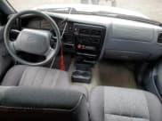 ✅ 1999 Toyota Tacoma • VIN: 4TAVL52N0XZ570861 • Lot: 80557875. Listed on Copart with 274,648 mi. Free auction sales archive from the USA and detailed vehicle history report at DreamBid. Image 8.