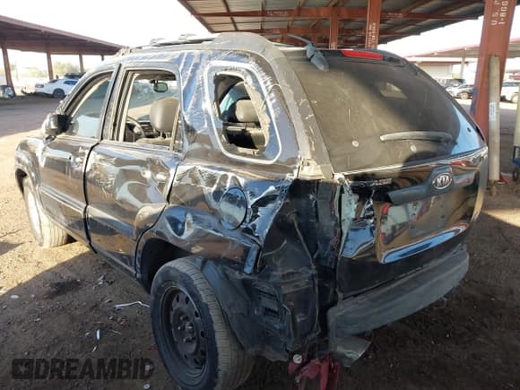 ✅ 2005 Kia Sportage LX • VIN: KNDJF723X57116260 • Lot: 40574315. Listed on IAAI with 235,396 mi. Free auction sales archive from the USA and detailed vehicle history report at DreamBid. Image 3.