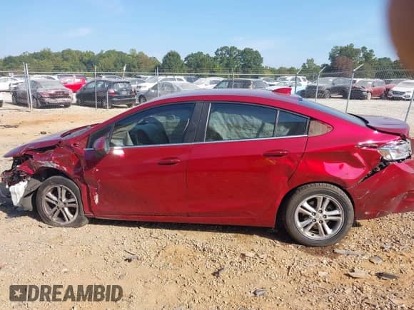 2017 Chevrolet Cruze LT z VIN 1G1BE5SM6H7220018, wystawiony jako IAAI lot #43299331 z przebiegiem 127 154 mil mil oraz . Historia ofert i sprzedaży dostępna na DreamBid. Obrazek 14.