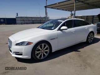 ✅ 2019 Jaguar XJ Portfolio • VIN: SAJWA2G72K8W21087 • Lot: 66017344. Listed on Copart with 22,671 mi. Free auction sales archive from the USA and detailed vehicle history report at DreamBid. Image 1.