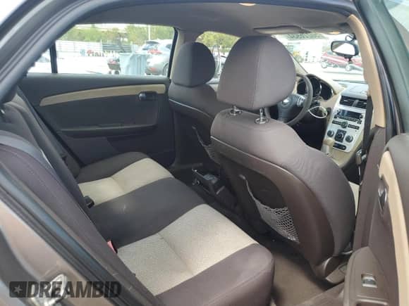 2011 Chevrolet Malibu 1LS z VIN 1G1ZB5E17BF171739, wystawiony jako Copart lot #63230574 z przebiegiem 153 931 mil mil oraz Szkoda całkowita • Salvage title. Historia ofert i sprzedaży dostępna na DreamBid. Obrazek 10.