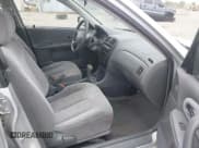 ✅ 2000 Mazda Protege DX • VIN: JM1BJ2225Y0211691 • Lot: 42464257. Listed on IAAI with 176,457 mi. Free auction sales archive from the USA and detailed vehicle history report at DreamBid. Image 5.