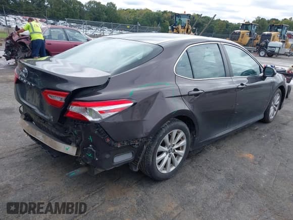 ✅ 2018 Toyota Camry LE • VIN: 4T1B11HK4JU582126 • Lot: 43427937. Listed on IAAI with 141,494 mi. Free auction sales archive from the USA and detailed vehicle history report at DreamBid. Image 4.