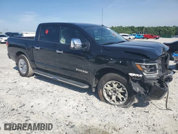 ✅ 2021 Nissan Titan SL • VIN: 1N6AA1ED6MN511883 • Lot: 57115084. Listed on Copart with 48,293 mi. Free auction sales archive from the USA and detailed vehicle history report at DreamBid. Image 4.
