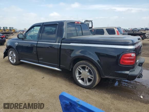 ✅ 2003 Ford F-150 Harley-Davidson • VIN: 1FTRW07373KD66326 • Lot: 59382485. Listed on Copart with 84,079 mi. Free auction sales archive from the USA and detailed vehicle history report at DreamBid. Image 2.