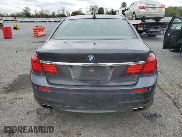 ✅ 2014 BMW 7 Series 750i xDrive • VIN: WBAYB6C58ED224525 • Lot: 86831595. Wystawiony na Copart z przebiegiem 143 385 mil. Bezpłatny archiwum sprzedaży aukcyjnych z USA i szczegółowy raport historii pojazdu na DreamBid. Zdjęcie 6.