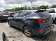 ✅ 2018 Hyundai Santa Fe 2.4L • VIN: 5NMZT3LB7JH094618 • Лот: 63293583. Опубликован ранее на Copart с пробегом 93 587 миль. Бесплатный доступ к архиву аукционных продаж из США и подробный отчёт об истории автомобиля на DreamBid. Изображение 2.