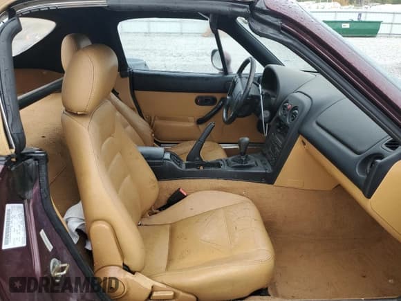 ✅ 1995 Mazda MX-5 Miata • VIN: JM1NA353XS0609672 • Lot: 85815505. Listed on Copart with 97,647 mi. Free auction sales archive from the USA and detailed vehicle history report at DreamBid. Image 10.
