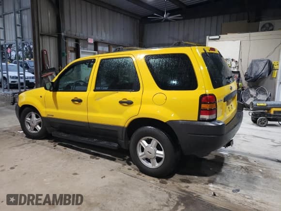 ✅ 2003 Ford Escape XLS Popular • VIN: 1FMYU92163KC64426 • Lot: 51274335. Listed on Copart with 76,533 mi. Free auction sales archive from the USA and detailed vehicle history report at DreamBid. Image 2.