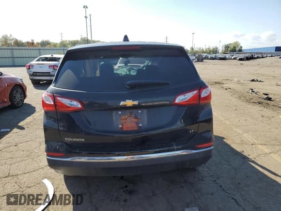 ✅ 2021 Chevrolet Equinox LT • VIN: 3GNAXKEV6ML345596 • Lot: 82462105. Wystawiony na Copart z przebiegiem 56 054 mil. Bezpłatny archiwum sprzedaży aukcyjnych z USA i szczegółowy raport historii pojazdu na DreamBid. Zdjęcie 6.