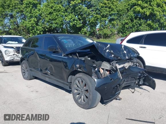 ✅ 2020 Land Rover Range Rover Velar S • VIN: SALYB2FV1LA252861 • Lot: 30038476. Listed on IAAI with 16,618 mi. Free auction sales archive from the USA and detailed vehicle history report at DreamBid. Image 1.