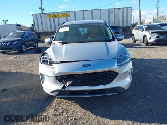 ✅ 2020 Ford Escape Titanium • VIN: 1FMCU9J91LUB17579 • Lot: 43718553. Listed on IAAI with 54,060 mi. Free auction sales archive from the USA and detailed vehicle history report at DreamBid. Image 12.