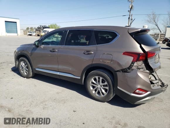 ✅ 2019 Hyundai Santa Fe SE • VIN: 5NMS23AD9KH121506 • Lot: 48209543. Wystawiony na Copart z przebiegiem 36 935 mil. Bezpłatny archiwum sprzedaży aukcyjnych z USA i szczegółowy raport historii pojazdu na DreamBid. Zdjęcie 2.
