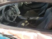 ✅ 2023 McLaren GT • VIN: SBM22GCA0PW002765 • Лот: 78866364. Опубликован ранее на Copart с пробегом Не указан. Бесплатный доступ к архиву аукционных продаж из США и подробный отчёт об истории автомобиля на DreamBid. Изображение 7.