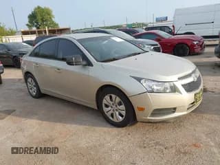 ✅ 2013 Chevrolet Cruze LS • VIN: 1G1PA5SGXD7291390 • Lot: 43143197. Listed on IAAI with 134,665 mi. Free auction sales archive from the USA and detailed vehicle history report at DreamBid. Image 1.