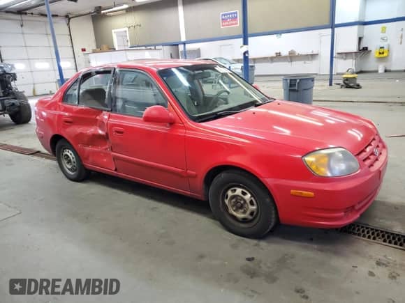 2004 Hyundai Accent GL z VIN KMHCG45C94U538368, wystawiony jako Copart lot #42444565 z przebiegiem 163 028 mil mil oraz Szkoda całkowita • Salvage title. Historia ofert i sprzedaży dostępna na DreamBid. Obrazek 4.